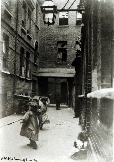 Children Playing in a Slum, 1899 by English Photographer